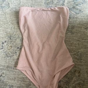 glitter pink bodysuit